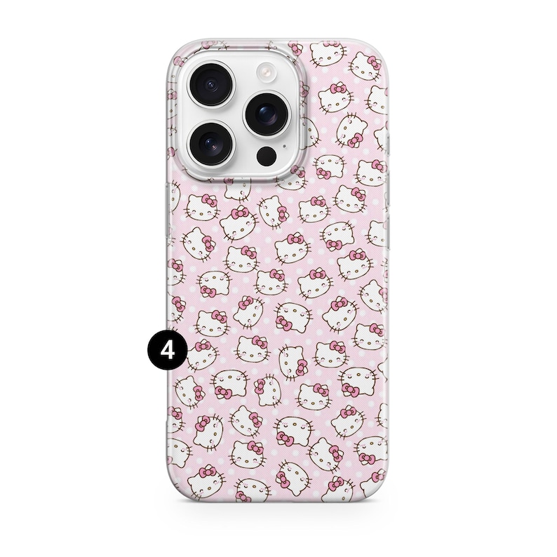 May include: A phone case featuring a repeating pattern of Hello Kitty faces with pink bows on a light pink background with white polka dots. The case has a clear border and a camera cutout.