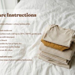 A cute taco character wrapped in a striped blanket, pastel colors - garment care instructions and washing guidelines for long lasting print quality - exclusive WeeBoss print detail