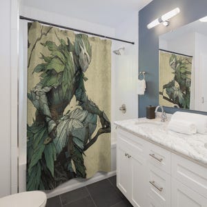 May include: A shower curtain featuring a detailed illustration of a figure adorned with leaves and foliage. The artwork has a muted color palette of greens, browns, and creams, creating a nature-inspired theme. The design is displayed in a bathroom setting.