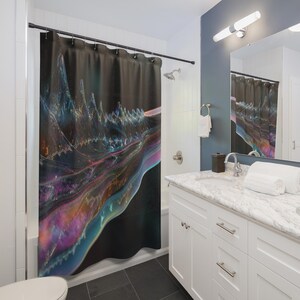 May include: A dark shower curtain with an abstract design featuring a flowing, iridescent pattern in shades of blue, purple, and pink. The design resembles a landscape with mountain-like peaks and flowing waves. The curtain is hanging in a bathroom setting.