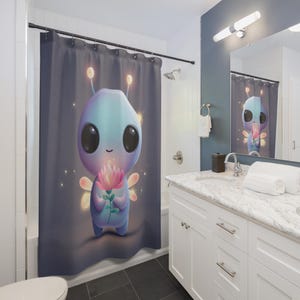May include: A shower curtain with a cartoon alien holding a pink flower. The alien is blue with large black eyes and glowing details. The background is dark blue with sparkling accents. The curtain is designed for a bathroom.