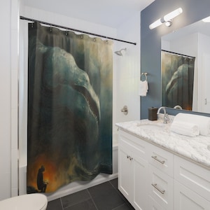 May include: A shower curtain featuring a surreal, artistic depiction of a large, aquatic creature looming over a small figure. The artwork is predominantly in shades of blue and gray, with a touch of orange and yellow.