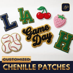 May include: A selection of chenille patches in different designs. Includes a navy blue letter "L", a green and gold "LA" patch, a pair of red cherries, a pink strawberry, a "Game Day" patch, a green "H" patch, and baseball patches.