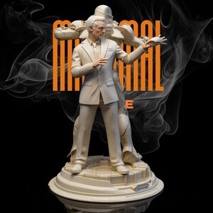 May include: A cream-colored statue of a man in a suit standing in front of a robotic figure. The statue is on a circular base with a detailed design. The background is black with orange text and white smoke-like shapes.