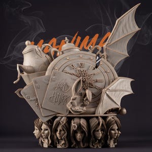 May include: A detailed sculpture featuring elements from Alice in Wonderland. It includes a clock, playing cards, a teapot, and a rabbit skull. The sculpture has bat-like wings and a base with multiple faces. The word "MAD HATTER" is visible.