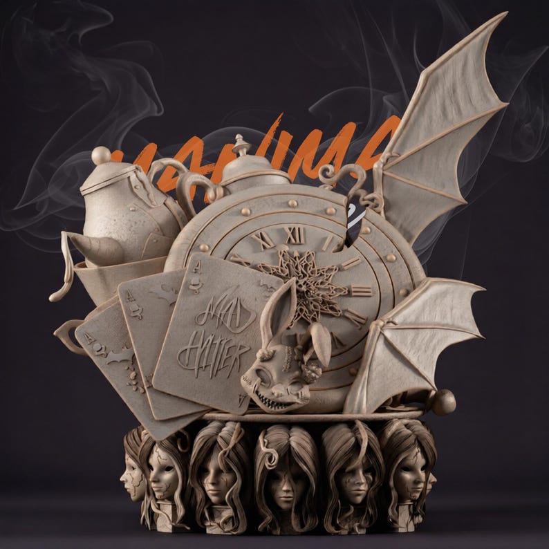 May include: A detailed sculpture featuring elements from Alice in Wonderland. It includes a clock, playing cards, a teapot, and a rabbit skull. The sculpture has bat-like wings and a base with multiple faces. The word "MAD HATTER" is visible.