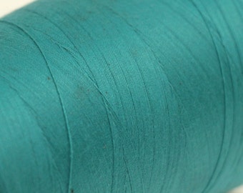 Large spool of vintage Teal Blue sewing thread