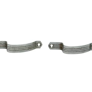 May include: Two vintage silver-toned drawer pulls. Each pull has a curved design with three horizontal grooves and two screw holes. The hardware is likely made of metal and shows signs of wear.