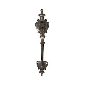 May include: An antique-style door pull handle with a dark bronze finish. The handle has detailed decorative elements, including a shield-shaped backplate and a long, vertical grip. The design suggests a vintage or rustic aesthetic, suitable for doors or cabinets.