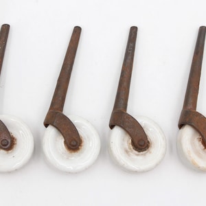 Set of Antique White Porcelain & Cast Iron Wheels