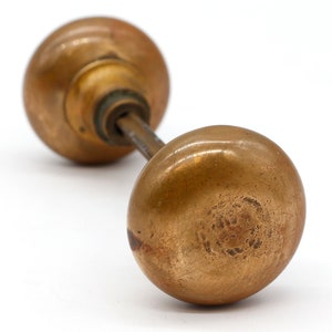 Pair of Vintage Round Patina Brass Passage Door Knobs