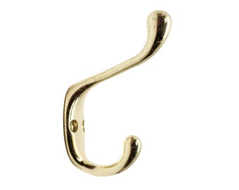 May include: A gold-toned metal hook with a rounded top and a single screw hole. The hook is designed for hanging items on a wall.