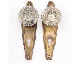 Vintage Art Deco deurknopset van helder glas en messing