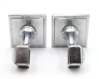 Set van twee Art Deco handdoekstangbeugels van vernikkeld messing.
