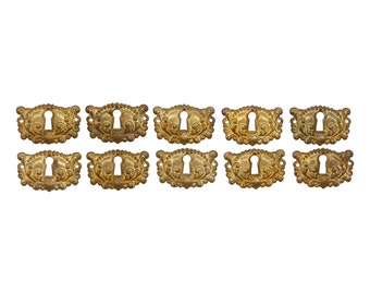 Set of 10 Vintage Ornate Pressed Brass Keyhole Covers