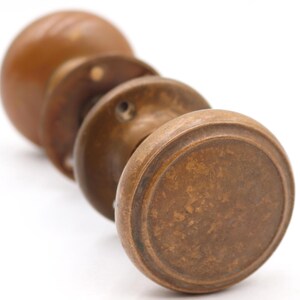 Vintage Concentric Bronze Passage Door Knob Set