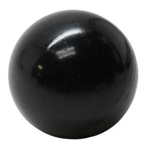 May include: A black, smooth, round ball.