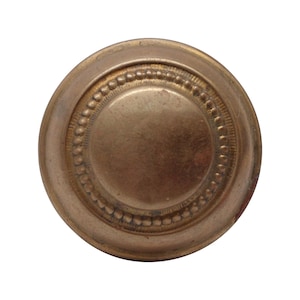 May include: A round, antique brass knob with a central disc and a decorative beaded border. The knob has a warm, aged patina, suggesting vintage or retro design. Ideal for furniture restoration or adding a touch of classic style.