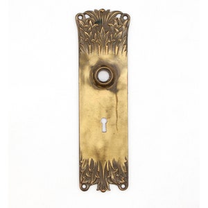 Antique 9 in. Romanesque Bronze Door Back Plate with Keyhole