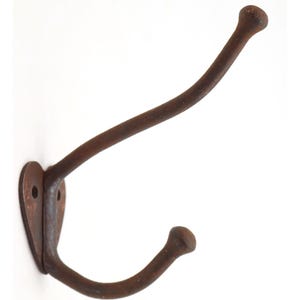 May include: A rustic, brown metal wall hook with a curved design. The hook has a rounded top and bottom, and a heart-shaped mounting plate with two screw holes. The metal has a distressed, aged appearance.