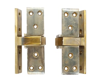 Pair of Traditional Harmon Brass Pocketed Pivot Door Hinges