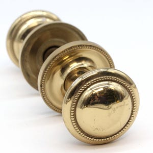 Traditional Heavy Polished Brass Concentric Passage Door Knob Set