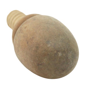 May include: A brown ceramic bottle stopper with a threaded top.