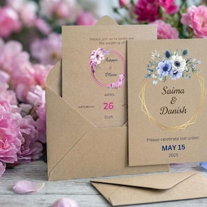May include: Two rectangular kraft paper wedding invitation cards with matching envelopes. One card features a pink floral wreath with the text 'Jareen & Olivia' and 'April 26 2025'. The other displays a blue floral arrangement and gold geometric frame with 'Saima & Danish' and 'May 15 2025'.