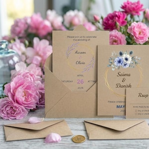 May include: Two kraft paper wedding invitations with matching envelopes and an RSVP card. The invitations feature floral illustrations, gold geometric frames, and printed text including names like Aaroon, Olivia, Saima, and Danish, with dates in 2025.
