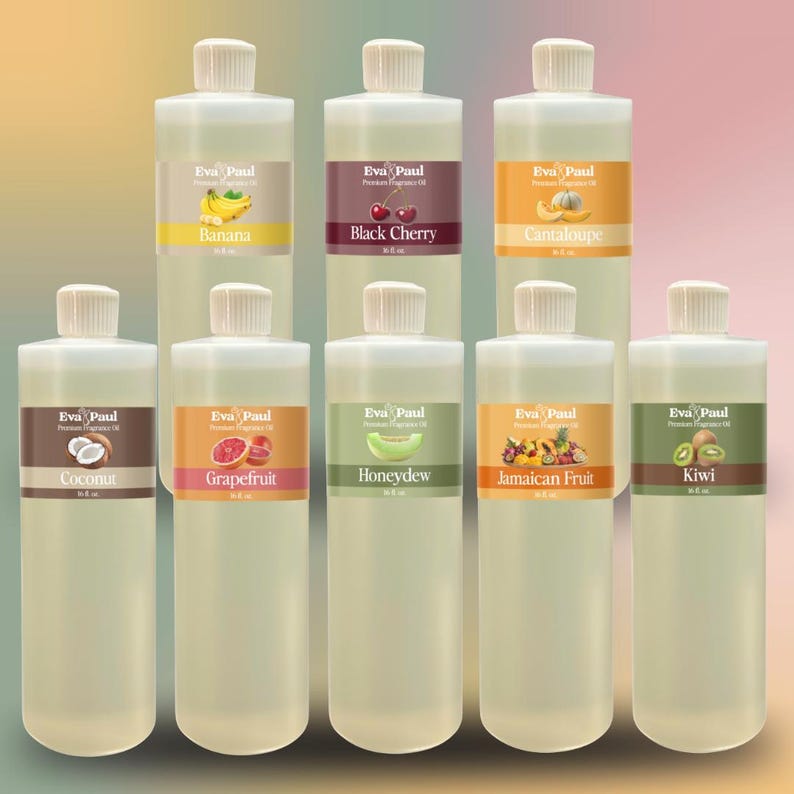 May include: A collection of clear plastic bottles with white caps, each labeled with a different fruit fragrance. Flavors include Banana, Black Cherry, Cantaloupe, Coconut, Grapefruit, Honeydew, Jamaican Fruit, and Kiwi. The brand name "Eva Paul" is displayed on each label.