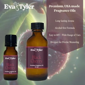 May include: Two brown glass bottles of "Black Cherry" fragrance oil with black caps. The bottles have labels with the brand name "Eva Tyler". The larger bottle contains 60 ml of oil, and the smaller bottle contains 15 ml. The background features text about the product.