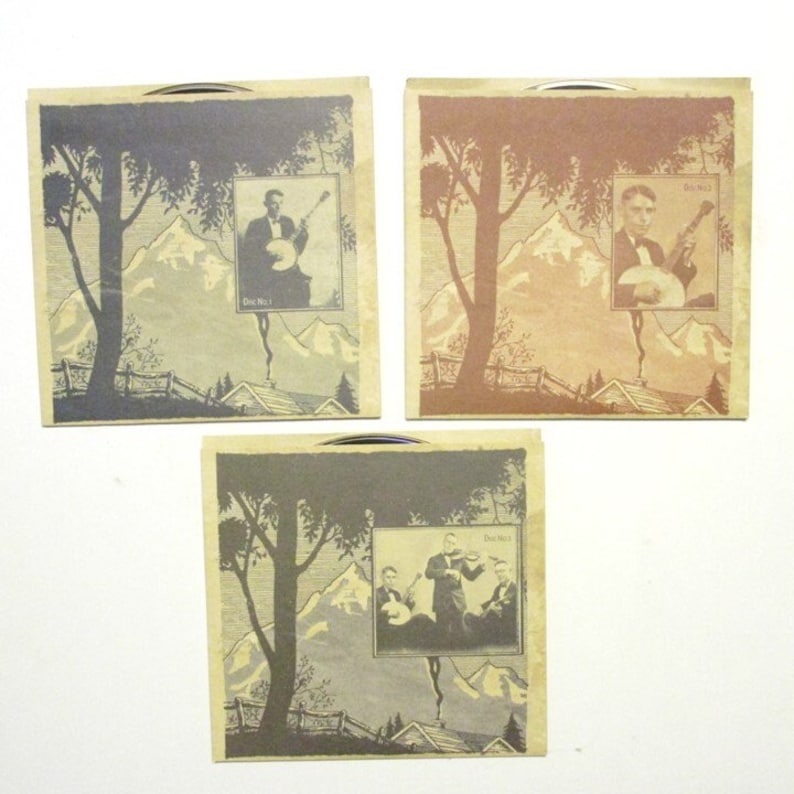 Three CDs in their paper sleeves, each with a North Carolina mountain scene in the background and an inset of a Charlie Poole photo.