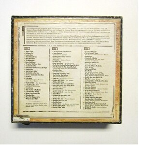 Back of box with some information and a list of songs.