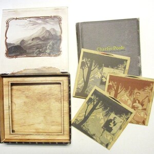 Display of box, pamphlet, and individual paper CD holders.  All graphics were made to resemble age and wear.  Faded colors, worn and torn areas are all part of the graphics.