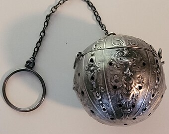 Edwardian Repousse Webster Sterling Silver Northwind Gargoyle Tea Ball Strainer