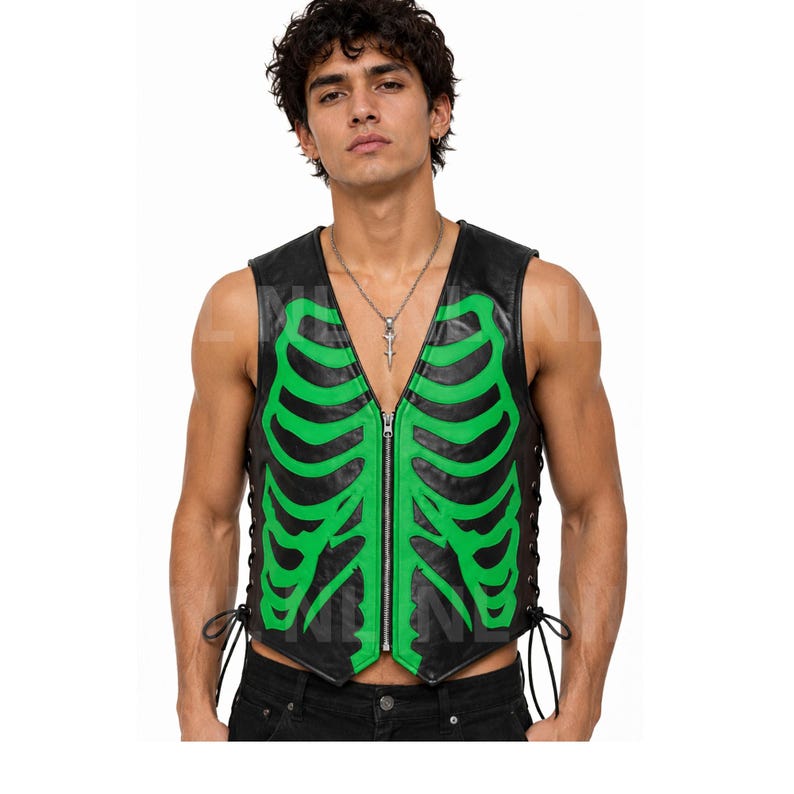 May include: Black leather vest with a green skeleton rib cage design. The vest has a zipper closure and lace-up sides. The model is wearing a silver necklace. The vest is sleeveless.