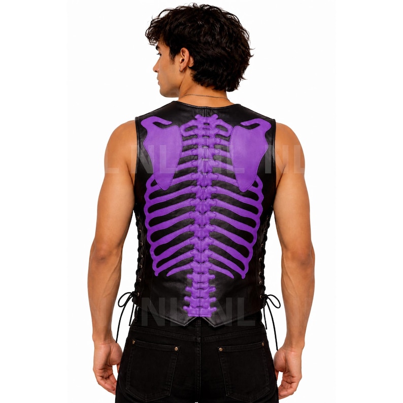 May include: Black leather vest with a purple skeleton design on the back. The vest has a lace-up closure on the sides. The skeleton design includes the rib cage and shoulder blades. The vest is sleeveless.