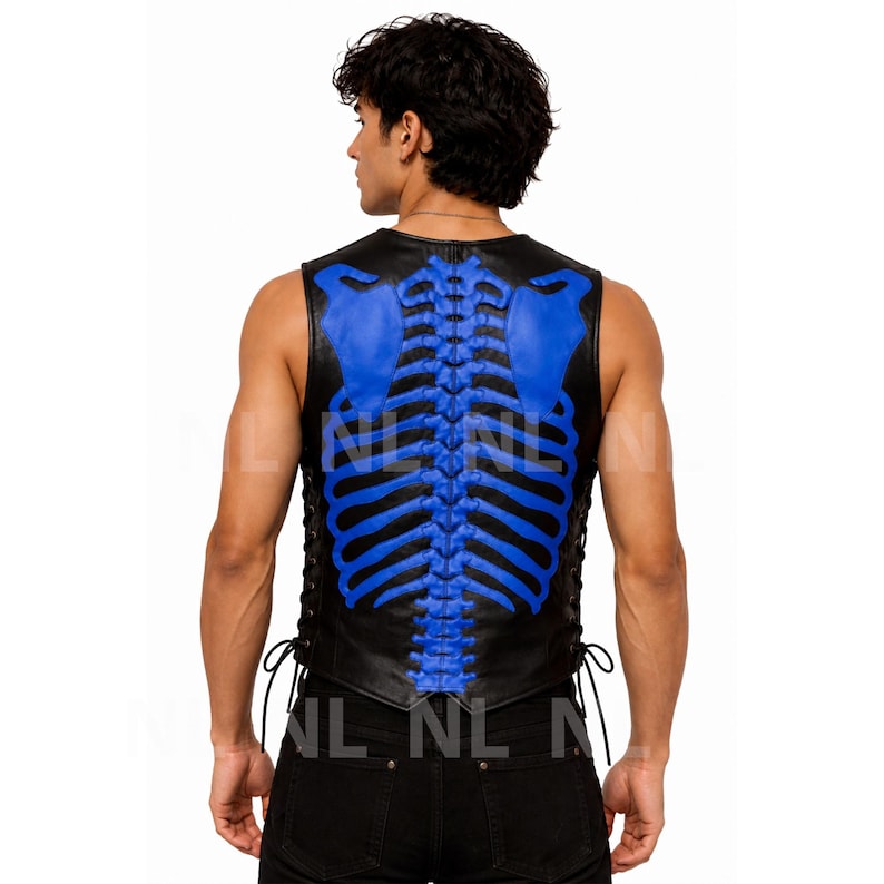 May include: Black leather vest with a blue skeleton design on the back. The vest has a lace-up closure on the sides and a sleeveless design. The blue skeleton design includes the spine and shoulder blades.