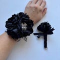 Solid Black Corsage or Boutonnière with Black Glitter Ribbon
