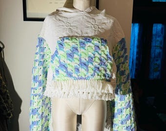 Sudadera con capucha tipo manta