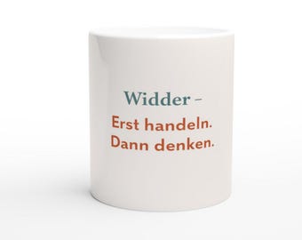 May include: White ceramic mug with the text "Widder - Erst handeln. Dann denken." in blue and red. The mug is cylindrical and sits on a white surface. The text is in German.