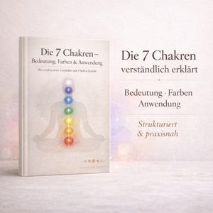 May include: A book titled "Die 7 Chakren" with text in German, featuring a colorful illustration of the seven chakras along a human silhouette. The book cover is light-colored with additional text.