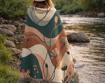 Manta tejida con paisaje floral abstracto - Manta bohemia en tonos tierra con flecos