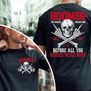 May include: Black t-shirt with a skull and crossbones design. The text "BOOMER" is above the skull, with "THE BADASS GENERATION" above the skull and "BEFORE ALL YOU SISSIES WERE BORN" below. The shirt also has the numbers "19" and "62".