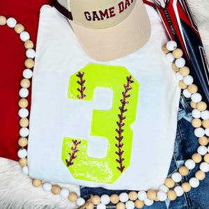 Softball Number Sequin Patch, bright yellow sequin patch with a large number 3 and decorative pink and black embroidery details.
