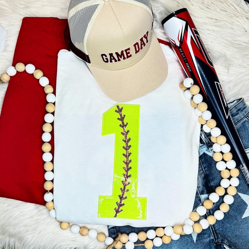 Softball Number Sequin Patch, bright yellow number 1 with pink and black baseball stitch design.