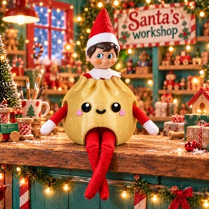 May include: A doll wearing a red and white pointed hat and red felt clothing, encased in a golden, rounded dumpling-shaped costume with a smiling face, black eyes, and pink cheeks, sitting with legs dangling over a wooden surface.