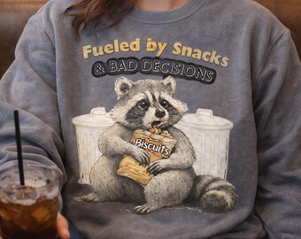 Fueled by Snacks Raccoon Sweatshirt | Cozy Animal Graphic Pullover
