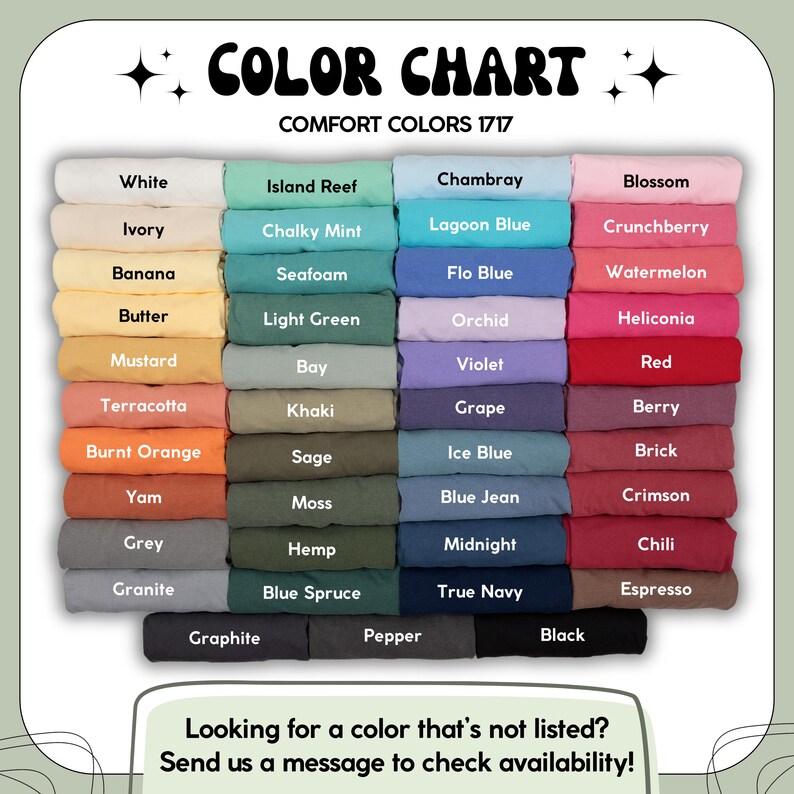 May include: A color chart for Comfort Colors 1717 t-shirts, displaying folded fabric swatches in various shades including white, yellow, orange, green, blue, pink, red, and black. Each swatch is labeled with its specific color name.