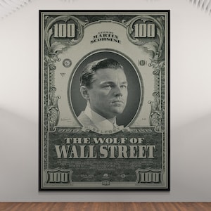 May include: A framed movie poster for "The Wolf of Wall Street" featuring a portrait of Leonardo DiCaprio. The design mimics a $100 bill, with the film's title prominently displayed. The poster is in black and white.